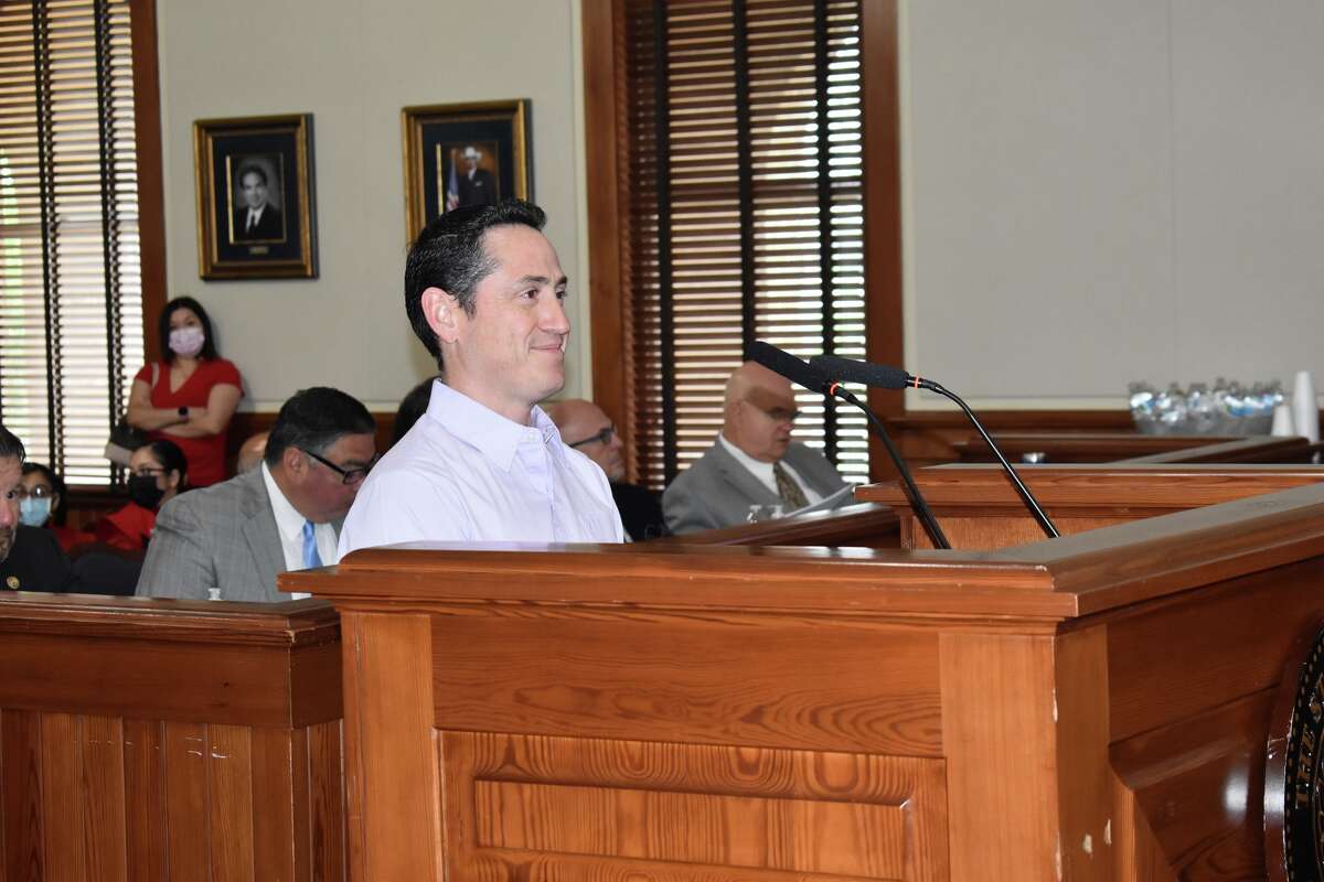 Carlos Pena was recognized by the county commissioner's court for his completion of the Brazil Ultra Tri. The race was made up of swimming, biking and running and the distances were equivalent to five iron man competitions. 