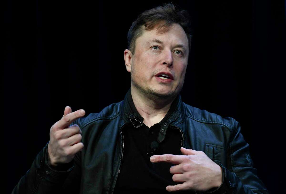 FILE -Tesla and SpaceX Chief Executive Officer Elon Musk speaks at the SATELLITE Conference and Exhibition in Washington, Monday, March 9, 2020. Musk’s Twitter acquisition and his plans for a more hands-off approach to moderating content is clashing with ambitious new laws in Europe that are meant to protect users from disinformation, hate speech and other harmful material. Musk, who describes himself as a “free speech absolutist,” pledged to buy Twitter for $44 billion this week. (AP Photo/Susan Walsh, File)