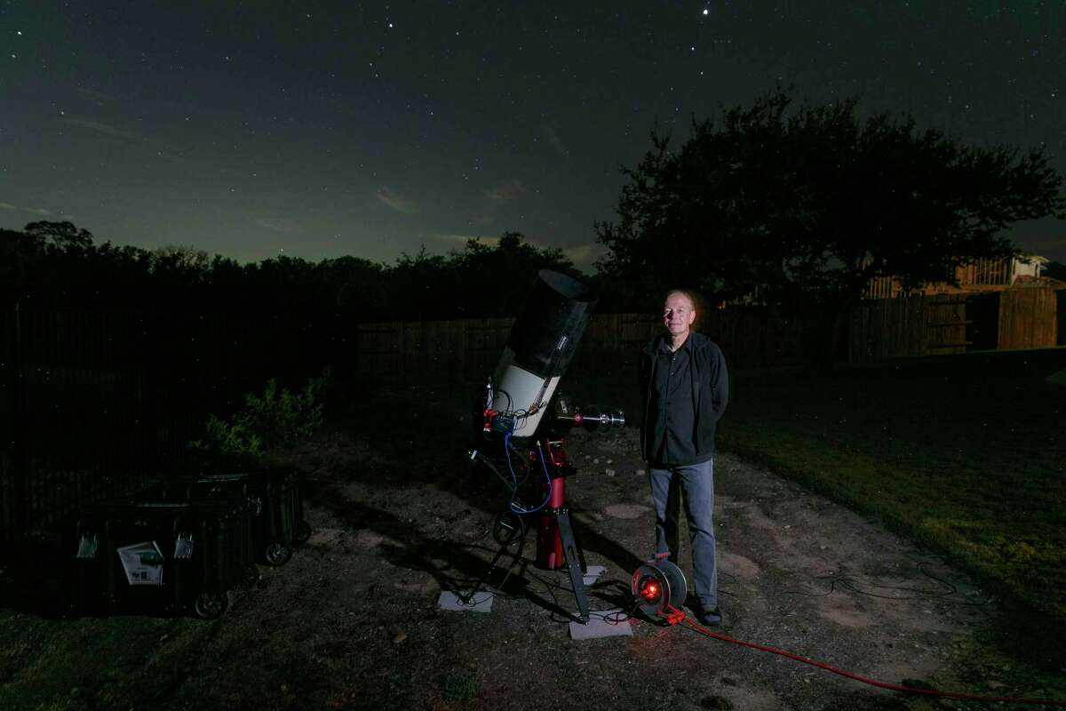 Chris Hill, an amateur astrophotographer, stands near his telescope and camera set up in the backyard of his home Dec. 2 in Dripping Springs. The City of Blanco joins the four neighboring International Dark Sky Community-designated communities in the Texas Hill Country: Fredericksburg, Dripping Springs, Horseshoe Bay and the Wimberley Valley.