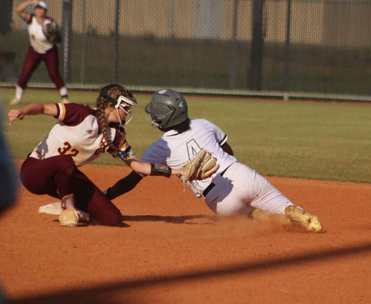 There will be lots of action around the second-base bag now that the state playoffs are here. This tag attempt took place during a Deer Park game last year. Deer Park, Memorial and Dobie are all in action tonight.