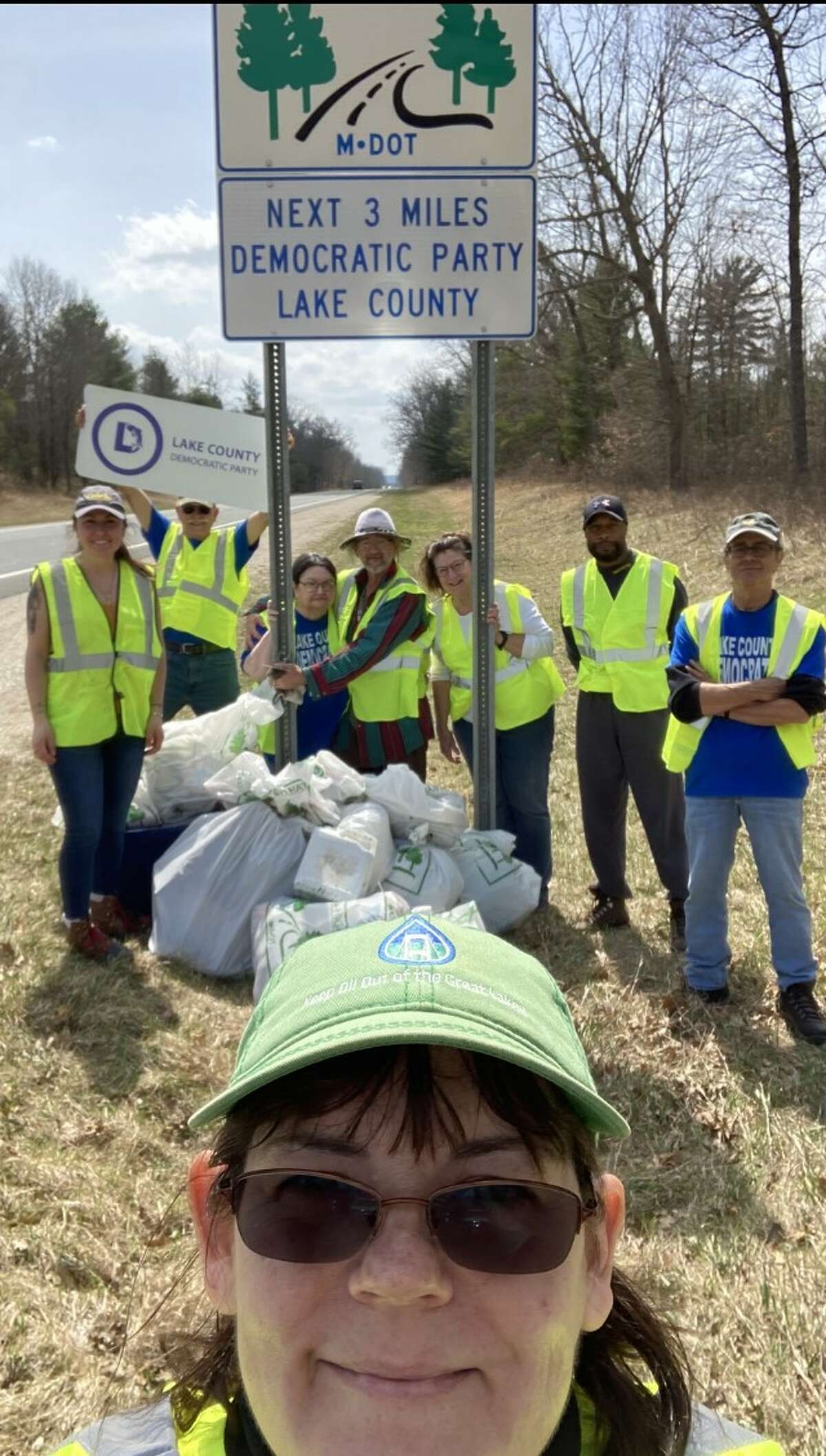 The Lake County Democratic Party  had a road cleanup on April 23rd, along M-37,  between 3 Mile Road and 7 Mile Road.  From left to right the names are Mary Minnick (Front), Amanda Siggins (Candidate for the Michigan House 101st District), Roger Kent, Virginia Ramos, Jim Thompson, Suzanne Breniser, Clyde Welford and Mark Everhart.