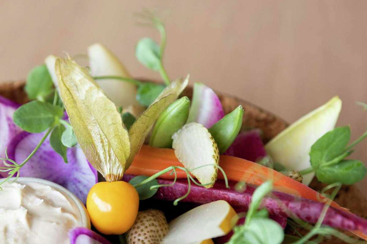 Farm vegetables raw and fermented with cashew miso prepared by Chef Garrison Price at Bear restaurant at Stanly Ranch in Napa, Calif.  Wednesday, April 27, 2022. The new Auberge Collection Resort will open to the public Friday, April 29.
