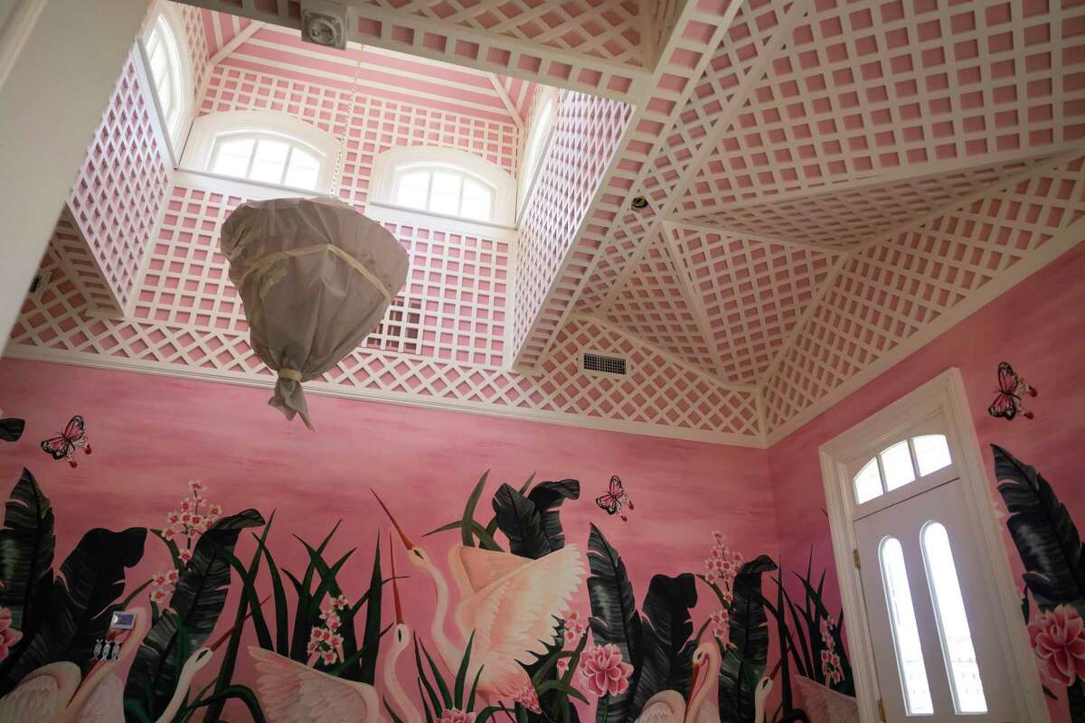 The pink interiors of the carriage house in the historic home owned and restored by design mother/daughter duo Mary Louise Stonecypher and Jordan Vaughn in Galveston on Saturday, April 22, 2022.