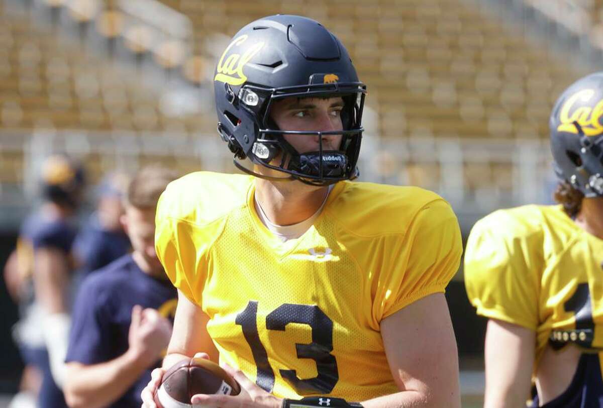 Cal quarterback Jack Plummer, left, a grad transfer from Purdue, is more established as a pocket passer, while his competition for the starting job, reshirt freshman Kai Millner, looks to have more ability to extend plays with his feet.
