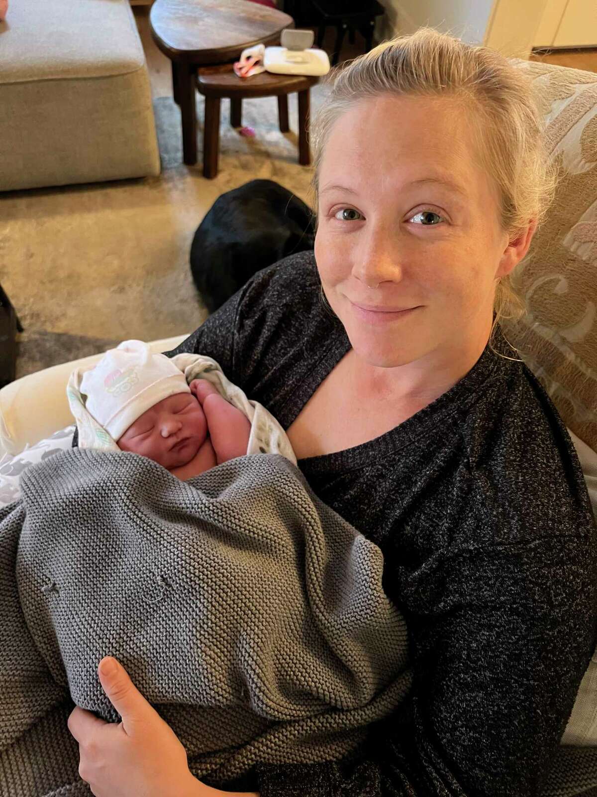 Courtney Morris and her new daughter Stella were doing well after Courtney gave birth at home using a birthing tub. A conscientious crew from the San Antonio Water System worked diligently to repair a water main to make the home birth possible.
