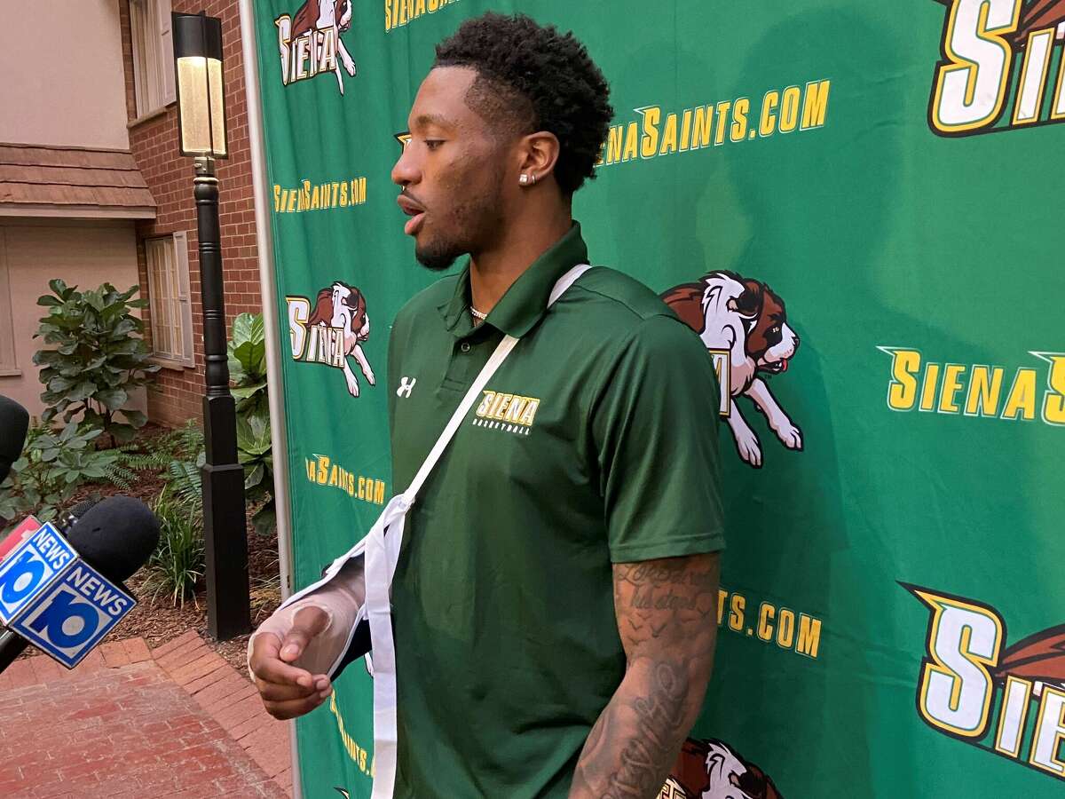 Siena basketball's Jared Billups talks to the media before Thursday's team banquet at The Desmond Hotel. (Mark Singelais/Times Union)
