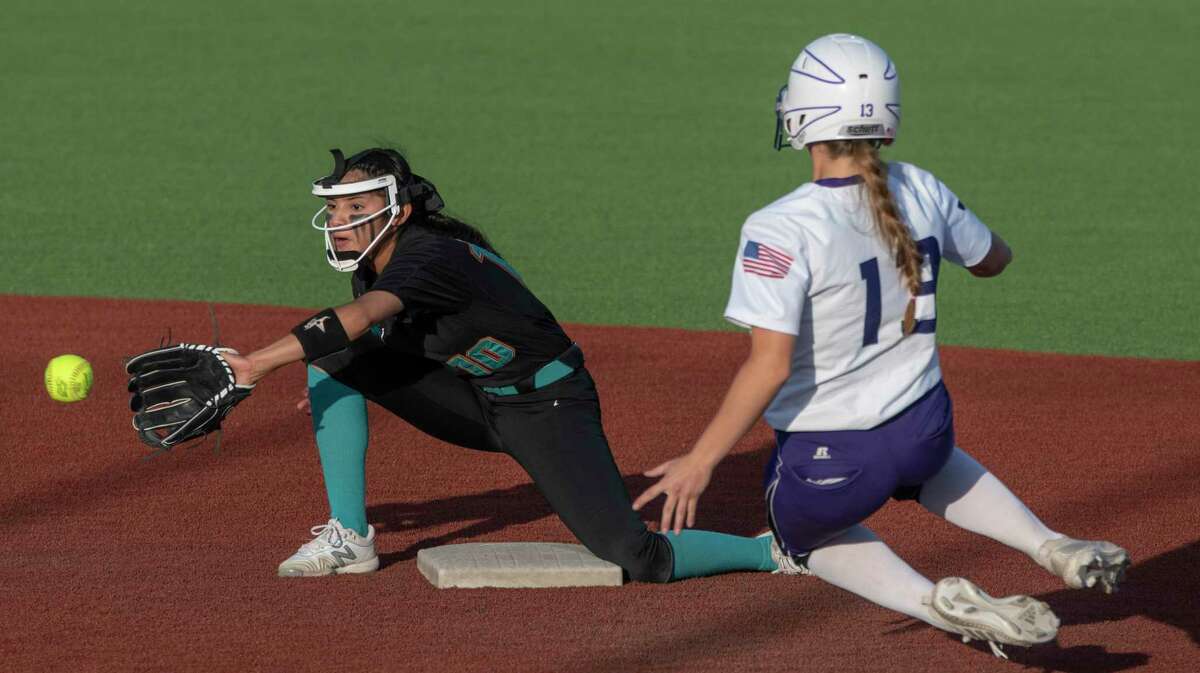 Midland High's Breigh Houser safely steals second as El Paso Pebble Hills' Ariana Hernandez reaches for the ball 04/28/2020 at Martin Field. Tim Fischer/Reporter-Telegram