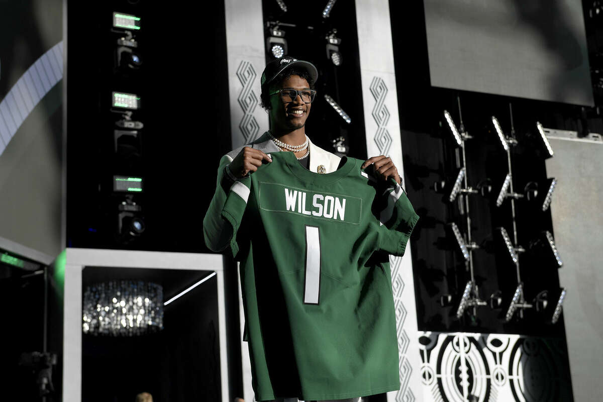 LAS VEGAS, NEVADA - APRIL 28: Garrett Wilson poses onstage after being selected tenth by the New York Jets during round one of the 2022 NFL Draft on April 28, 2022 in Las Vegas, Nevada. (Photo by David Becker/Getty Images)