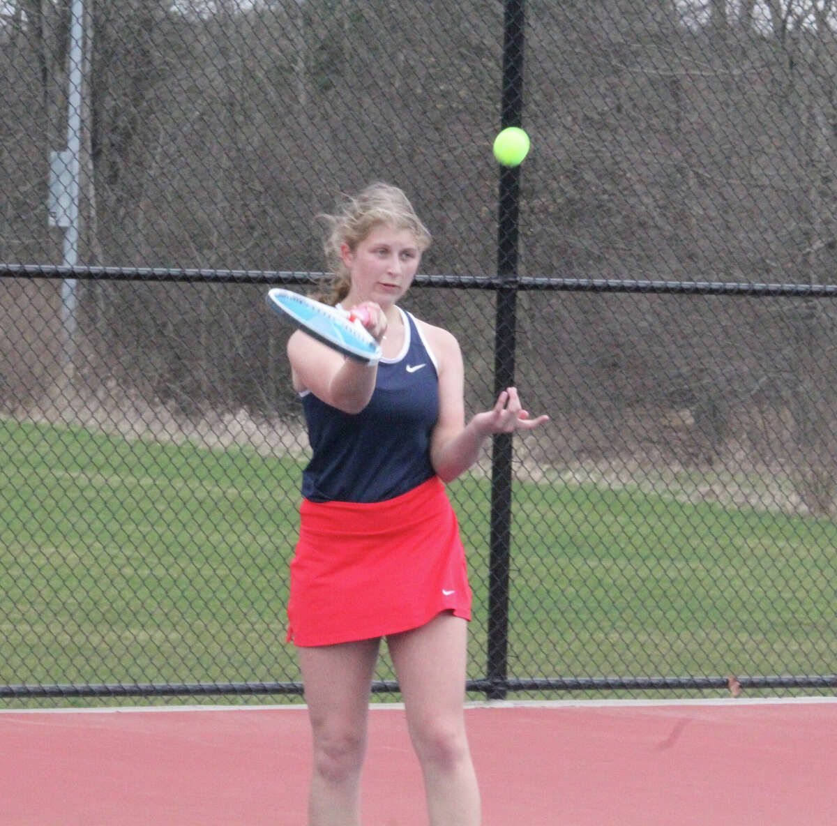 Addison Mossel plays the ball at No. 1 singles for Big Rapids' tennis team.