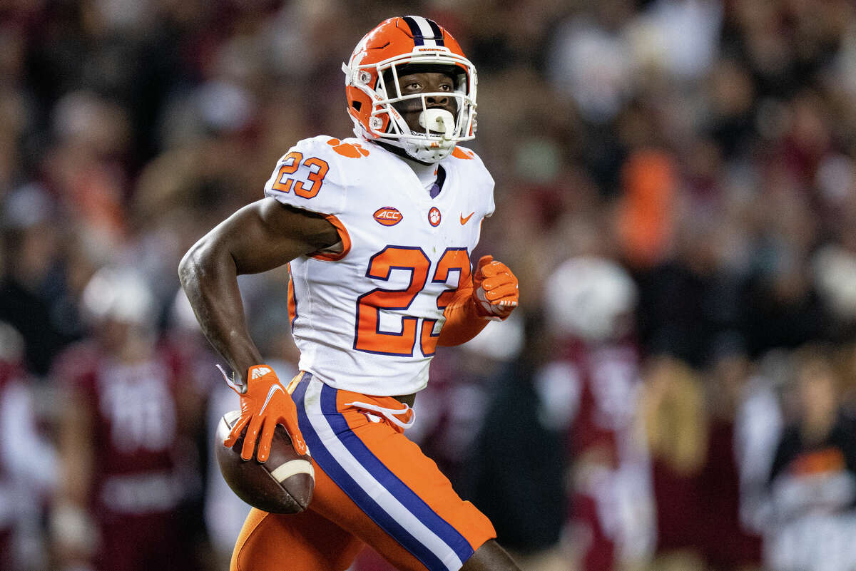 Cornerback Andrew Booth Jr., of the Clemson Tigers reacts after making an interception against the South Carolina Gamecocks during their game at Williams-Brice Stadium on November 27, 2021 in Columbia, South Carolina.