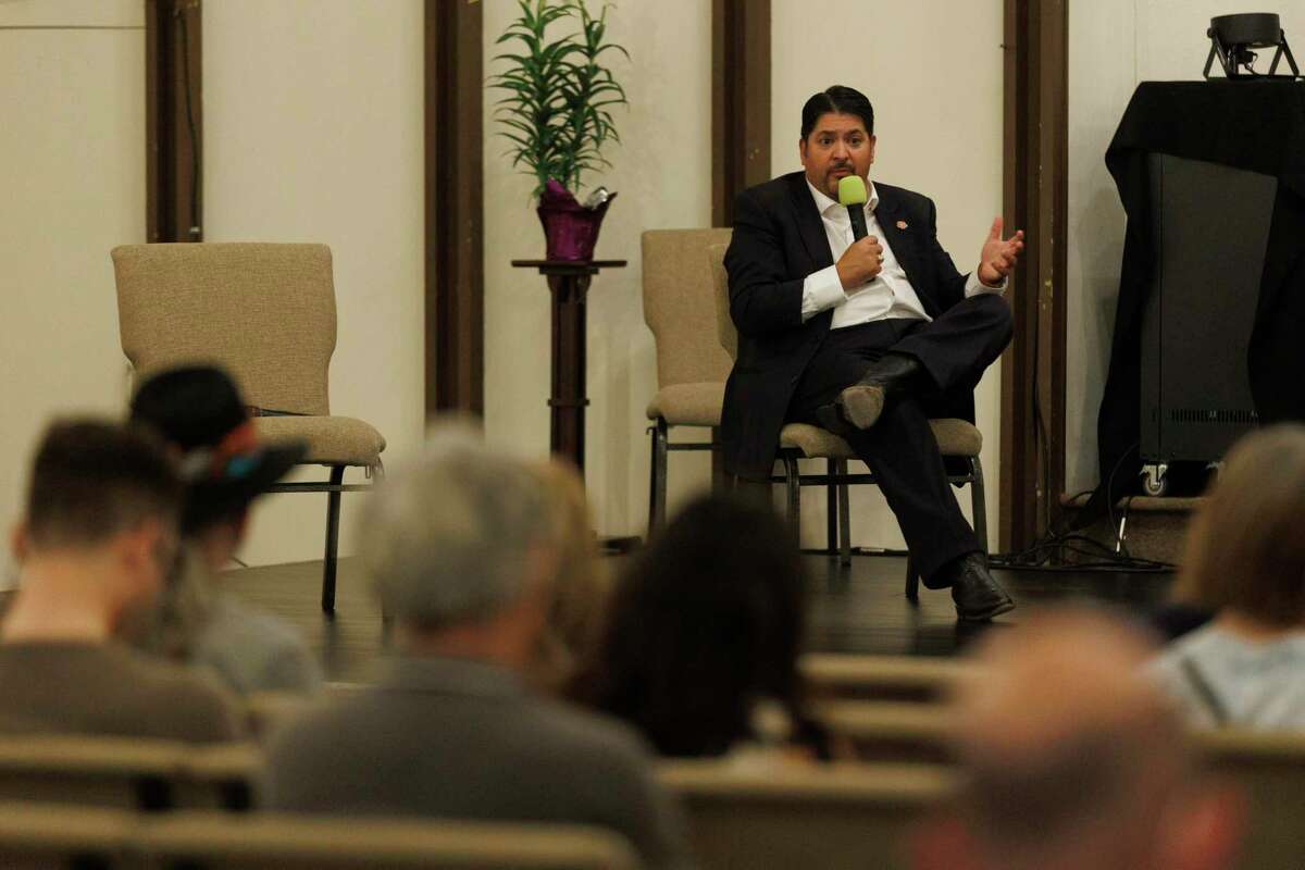 Rudy Garza, interim CEO of CPS Energy, answers questions from community members about the future of J.K. Spruce Power Plant and future energy costs Thursday evening, April 28, 2022, at Woodlawn Pointe Auditorium.