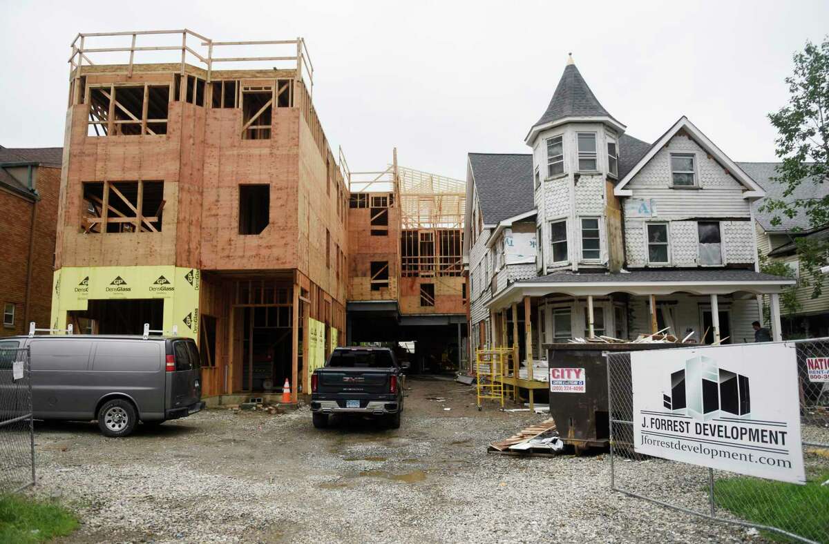 Construction continues on the Housing Development Fund’s Community Land Trust affordable housing in Stamford last year.