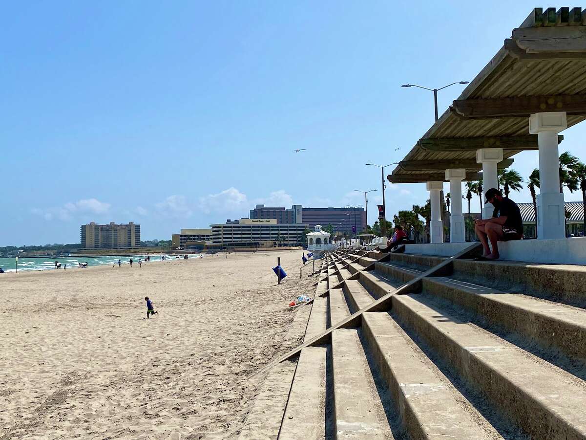 A beautifully designed historic seawall faces the bayfront at McGee Beach, a family-friendly beach in downtown Corpus Christi. 