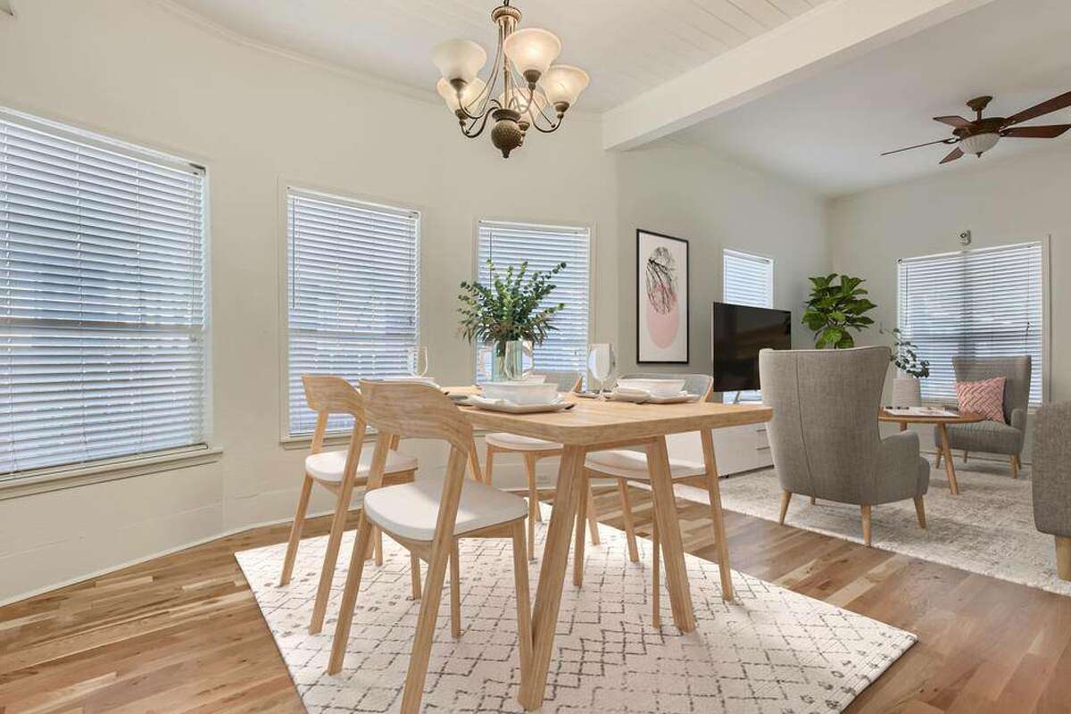 The open floor concept puts the dining area between the kitchen and living room. 