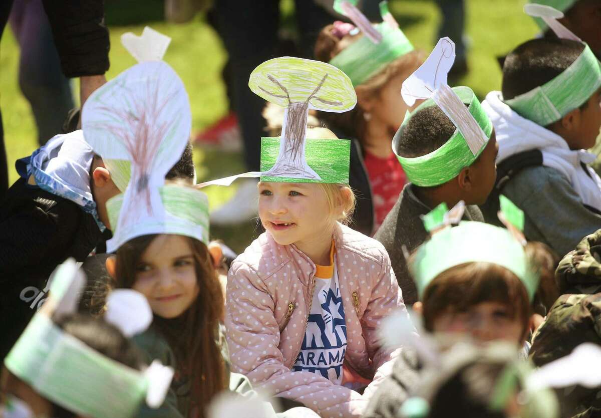 Students made their own tree hats for the annual Arbor Day celebration at Naramake School in Norwalk, Conn., on Friday, April 29, 2022.