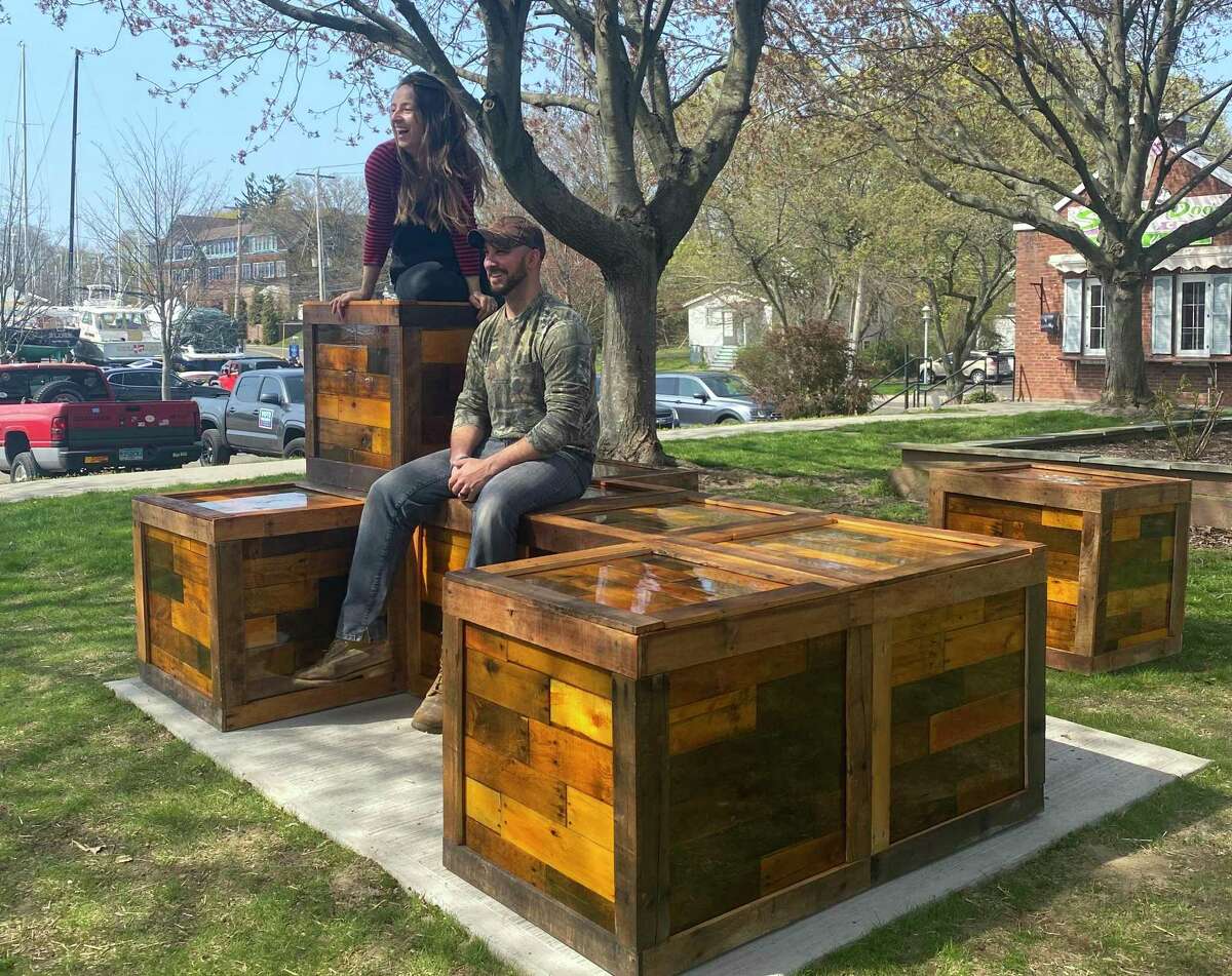 Community Block is a new and artistic take on the traditional bench meant as an art project commissioned by the MAC. Pictured are designer IO Escu and woodworker Rich Borque.