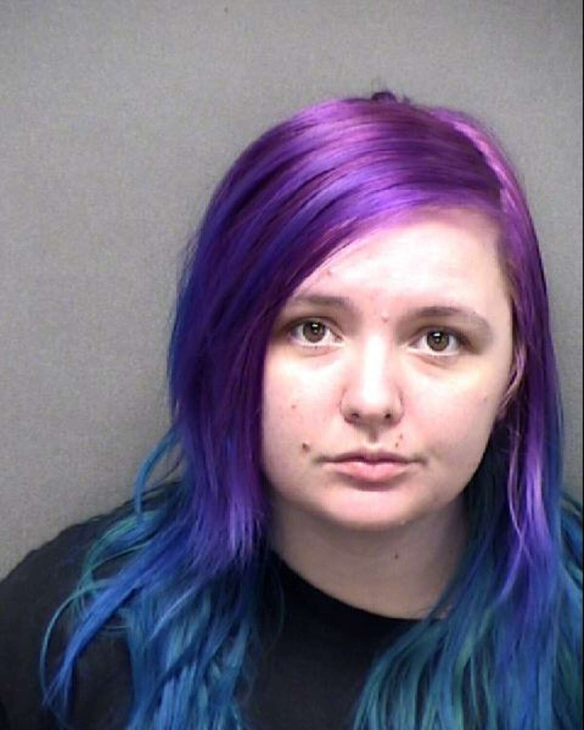 Stacy Mae Lynn Page, 27, was indicted on counts of murder and engaging in organized criminal activity.