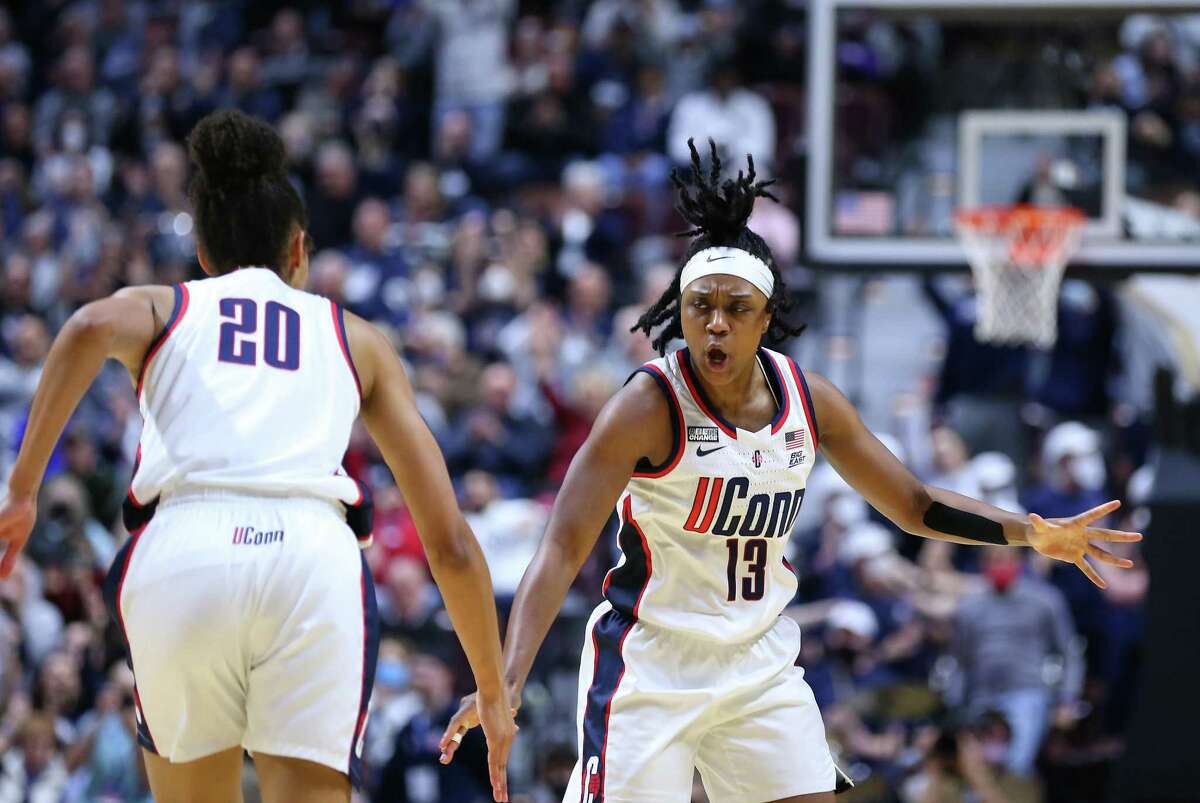 UConn guard Christyn Williams (13) and UConn forward Olivia Nelson-Ododa (20) react during the Big East Tournament final against Villanova in March.