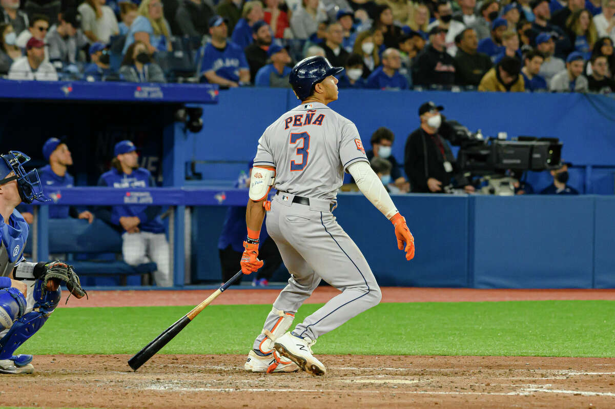 Houston Astros' Jeremy Pena (3) watches his home run against the Toronto Blue Jays during the sixth inning of a baseball game Friday, April 29, 2022, in Toronto. (Christopher Katsarov/The Canadian Press via AP)