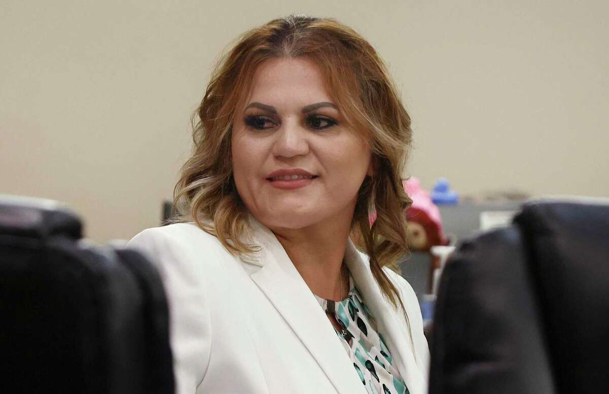 Angelica Navarro-DePaz, recorded paying an undercover San Antonio police detective to kill her boyfriend's sister in 2017, said she was forced by an extortionist — and police informant — to fake the plot.