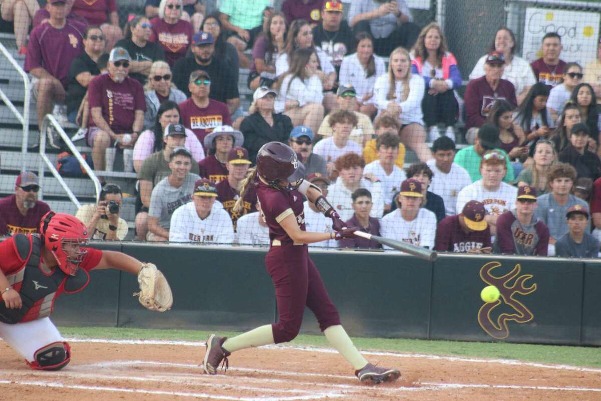 Before a packed house Thursday night at Doll Forrest Field, Madison Bailey sends a ball foul. The team easily claimed the bi-district title Friday night, following a 11-0 win.
