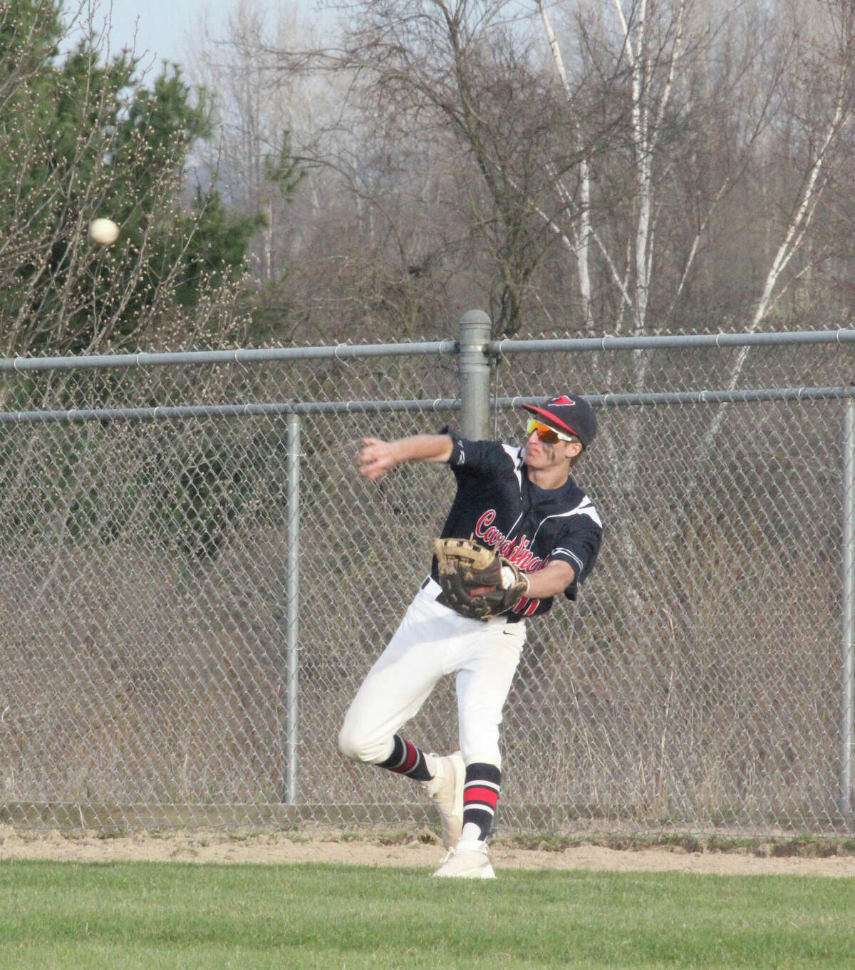 Big Rapids third baseman Grant Kidder makes a throw to another base during CSAA action against Fremont on Friday.