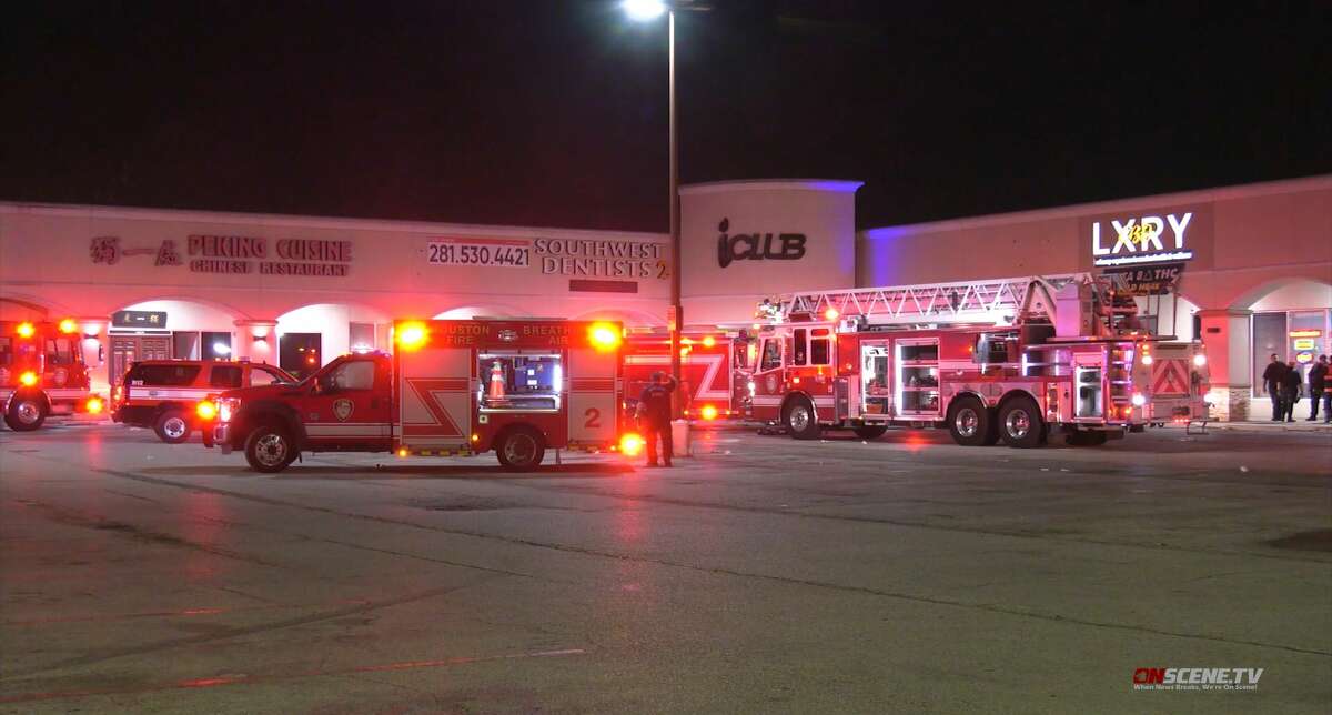 Houston firefighters respond to a fire at the iClub nightclub in southwest Houston on April 30, 2022.