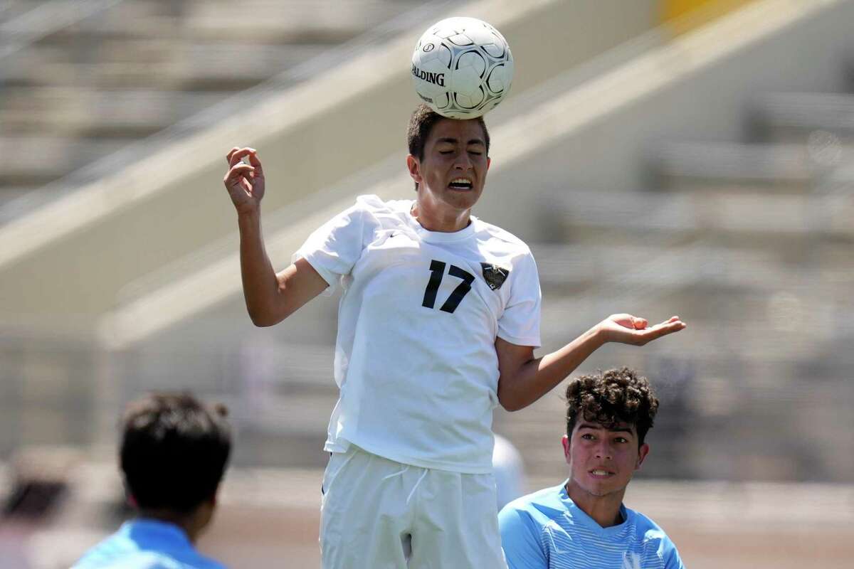 Jordan's Ryan Armijo (17) heads the ball during the first half of the Region III-5A final high school soccer playoff game against Northeast Early College, Saturday, April 9, 2022, in Humble, TX.