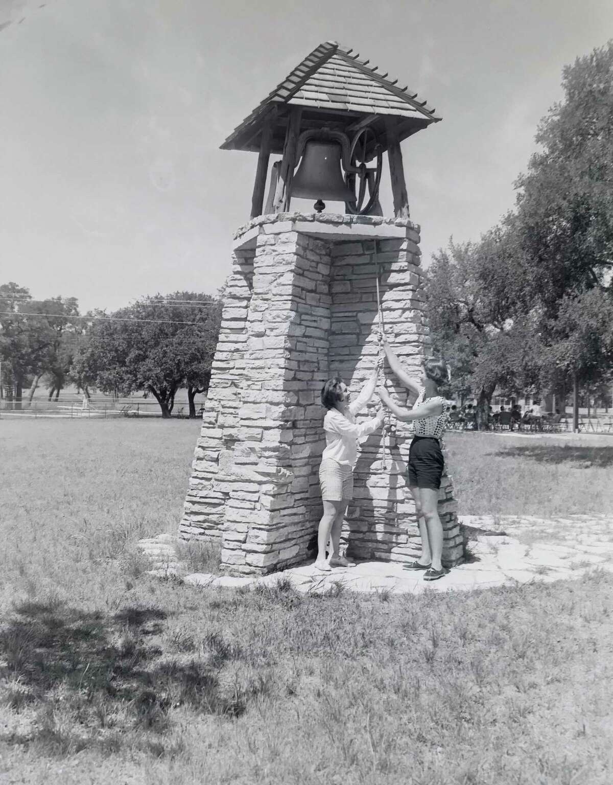 The bell tower at Camp Capers was rung by campers to signal mealtimes, swimming or the end of the rest period, as shown in this 1962 photo.