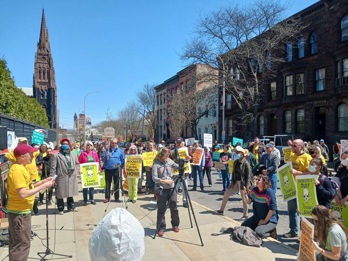 Organizations and residents of the Capital Region gather near the Governor's Mansion to protest the operation of the Norlite, LLC. facility in Cohoes on Saturday, April 30, 2022.  