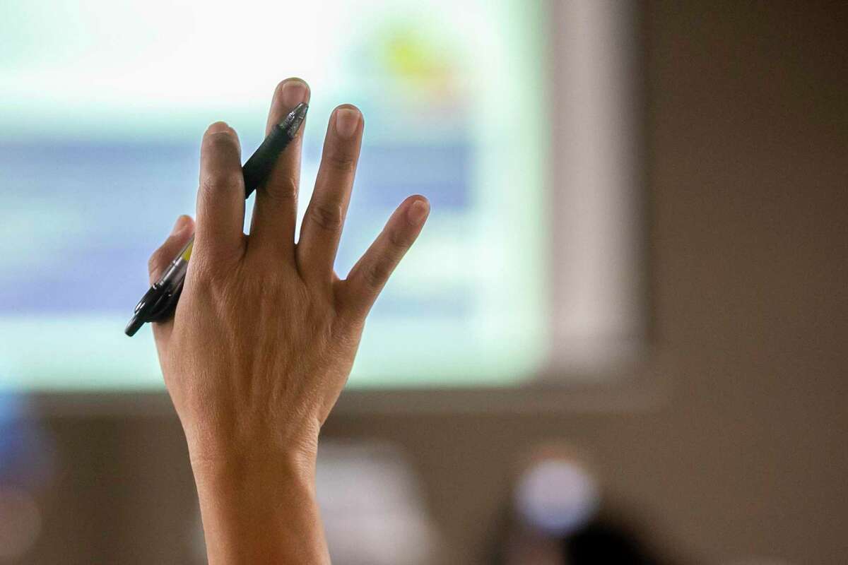 A participant has a question during a property tax workshop. Residents received information on how to apply for exemptions, how to file a protest, and how to prepare for the Assessment Review Board (process.
