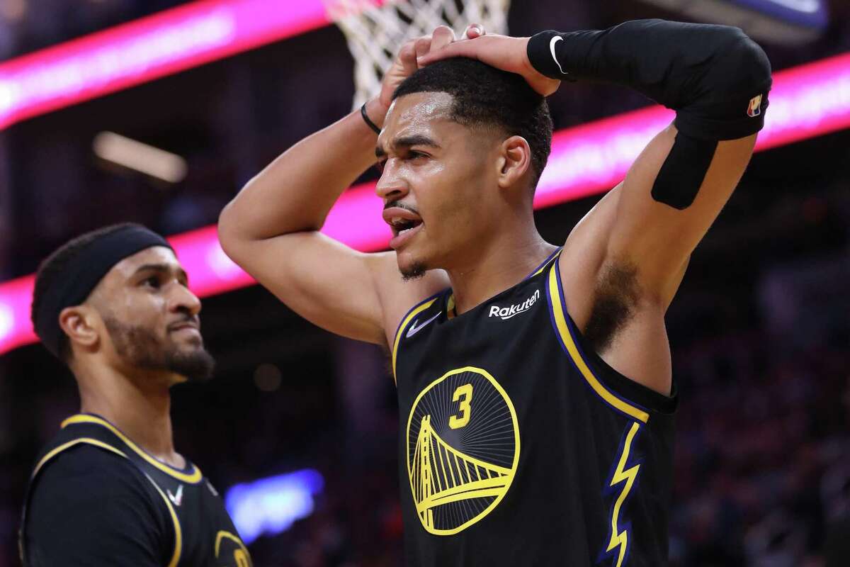 Golden State Warriors’ Jordan Poole and Gary Payton II against Denver Nuggets during Warriors’ 102-98 win in Game 5 of NBA Western Conference First Round playoff game at Chase Center in San Francisco, Calif, on Wednesday, April 27, 2022.
