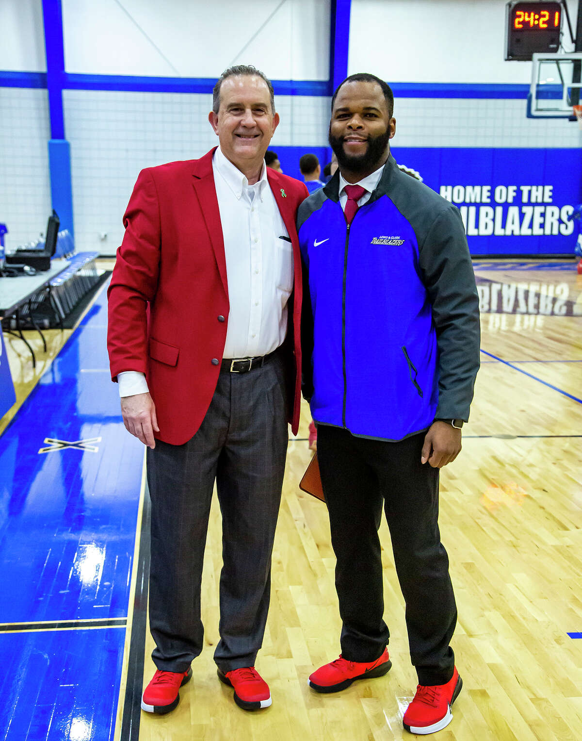 Kavon Lacey, right, with former LCCC men's basketball coach and athletic director Doug Stotler.