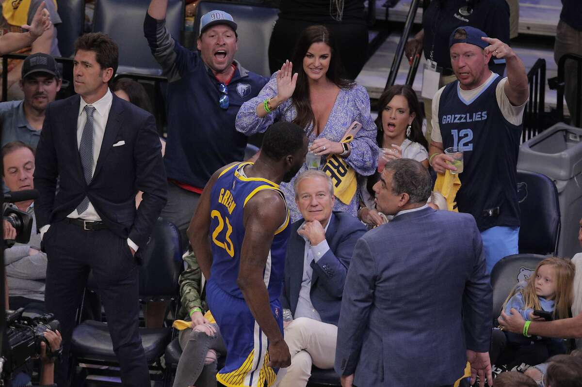 Draymond Green (23) leaves the court after being ejected for a flagrant 2 technical foul in the first half as the Golden State Warriors played the Memphis Grizzlies in Game 1 of the second round of the NBA Playoffs at Fedex Forum in Memphis, Tenn., on Sunday, May 1, 2022.