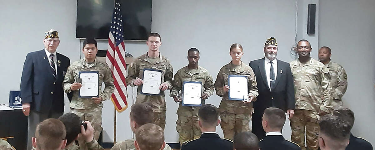 On April 28, Edwardsville American Legion Post 199 hosted the SIUE ROTC Awards Ceremony. Commander Ron Swaim, left, and Senior Vice Commander Wes Sterling, third from right, presented American Legion educational and military excellence awards to the winners.