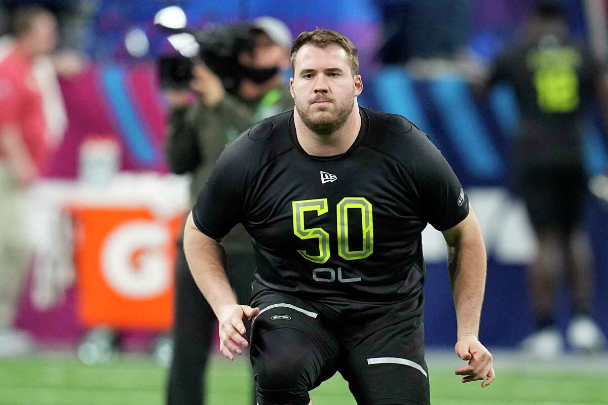 Michigan offensive lineman Andrew Stueber runs a drill during the NFL scouting combine on March 4 in Indianapolis.