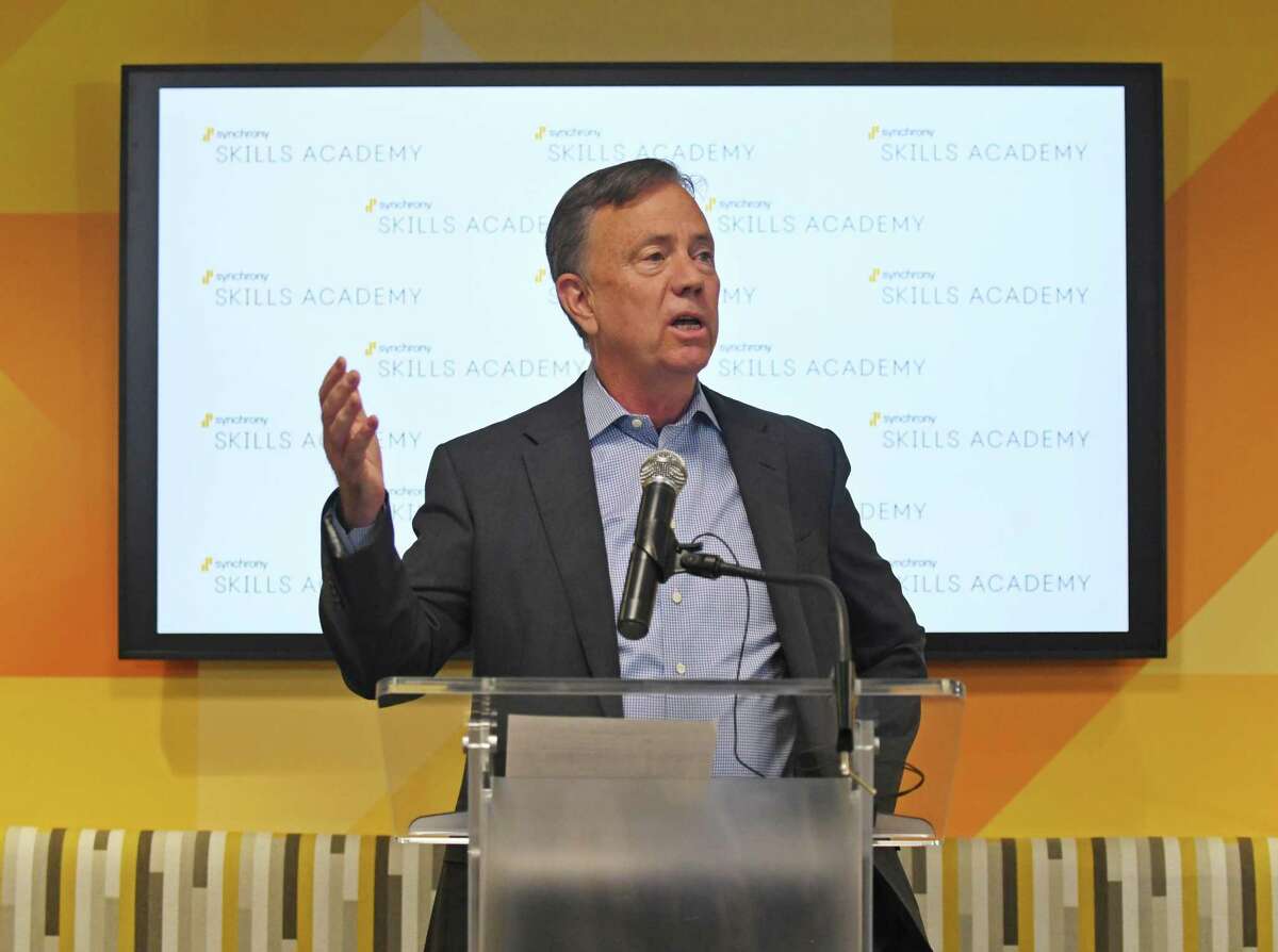 Connecticut Gov. Ned Lamont speaks at the Synchrony Financial headquarters in Stamford, Conn. Monday, April 25, 2022.
