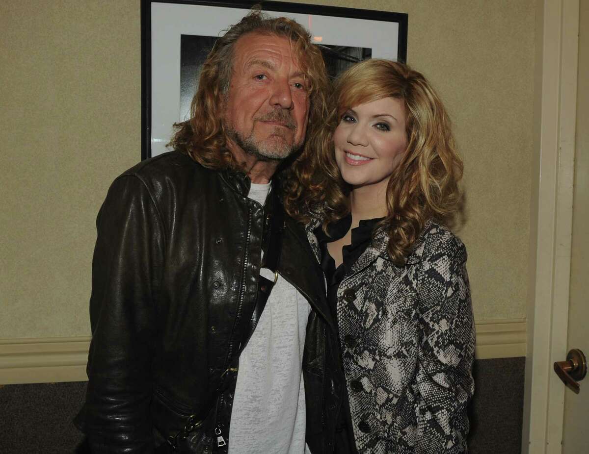 Singers Robert Plant and Alison Krauss will perform Friday night at the Saratoga Performing Arts Center. Five decades ago, Plant and his old band, Led Zeppelin, played a legendary show at Schenectady's Aerodrome. In this photo, Plant and Krauss are shown  backstage at the 10th Americana Music Association honors and awards at the Ryman Auditorium on Oct. 13, 2011 in Nashville, Tennessee.