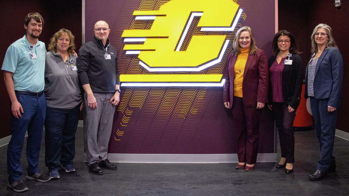 Central Michigan University Athletics and MyMichigan Health have announced a new sports medicine partnership. As part of the multi-year partnership, MyMichigan Health will provide CMU student-athletes with specialized sports medicine care and streamlined access to comprehensive health care services. Celebrating the announcement are (left to right): AJ Pinney, D.O., fellowship-trained primary care sports medicine specialist; Gai Clemmer, practice manager, MyMichigan Medical Group; Brian Locke, D.P.T., A.T., C.S.C.S., physical therapist; Amy Folan, Zyzelewski Family Associate vice president and director of athletics, Marita Hattem-Schiffman, president, MyMichigan Medical Centers in Alma, Clare and Mt. Pleasant; and Ann Dull, P.T., M.B.A,. D.P.T.,director of musculoskeletal service line, MyMichigan Health.