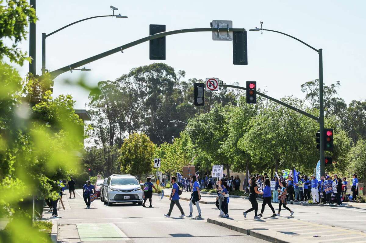 Stanford Health nurses have ended their strike, seen here, and voted in favor of a new contract, with pay increases and improved benefits.