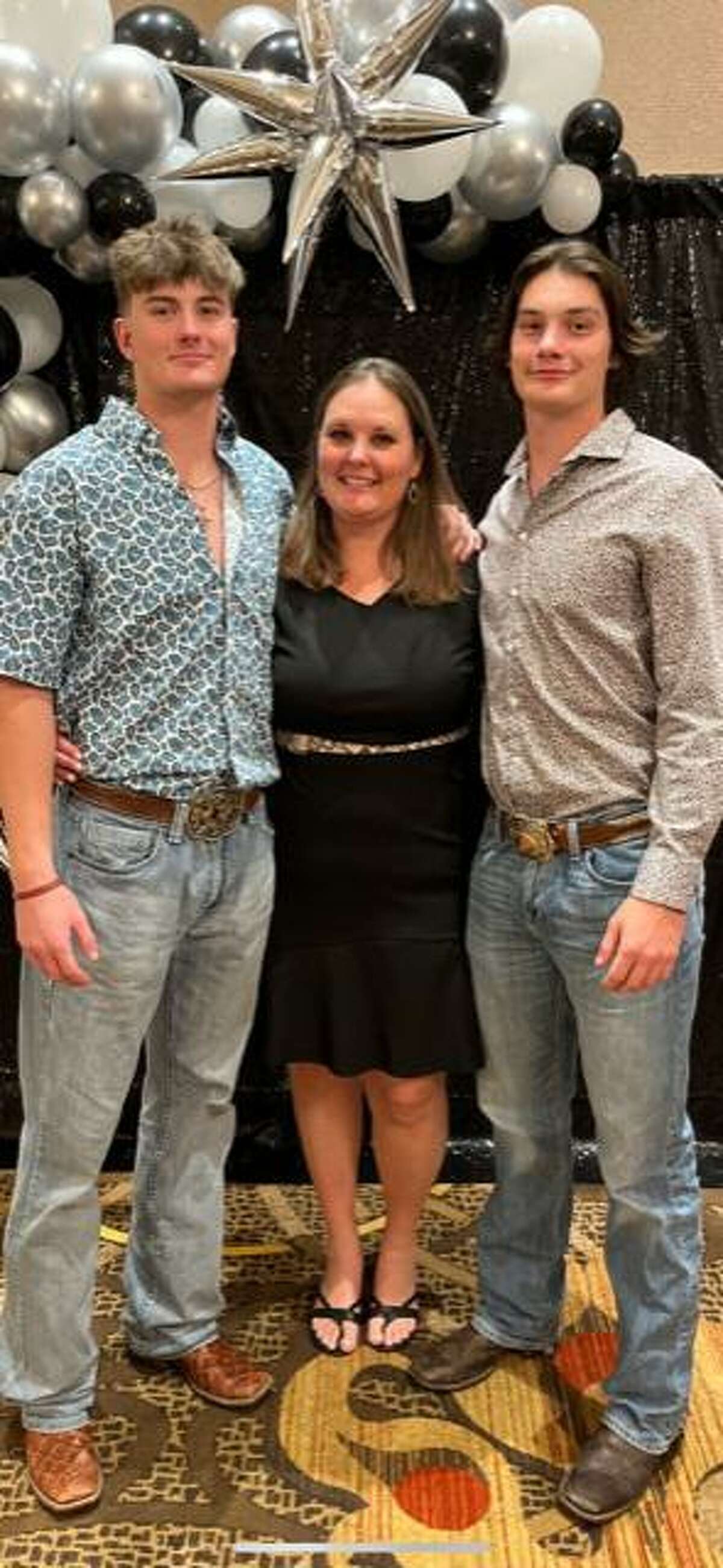 Tara Faith, sixth grade math teacher at Roberts Middle School and track coach at Leaman Junior High School in Lamar CISD, poses with her sons.