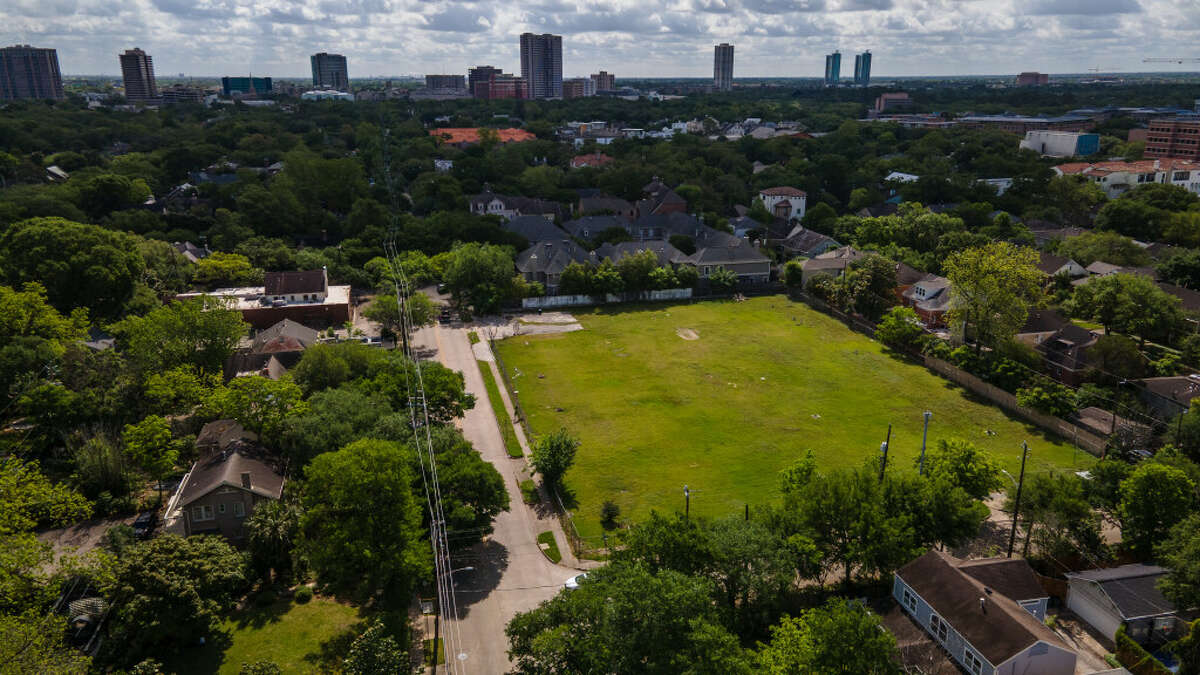 The towers along Main Street and Fannin Street can be seen east of the vacant property at 1717 Bissonnet Street on Ashby Street in the Boulevard Oaks neighborhood of Houston, Friday, April 29, 2022.