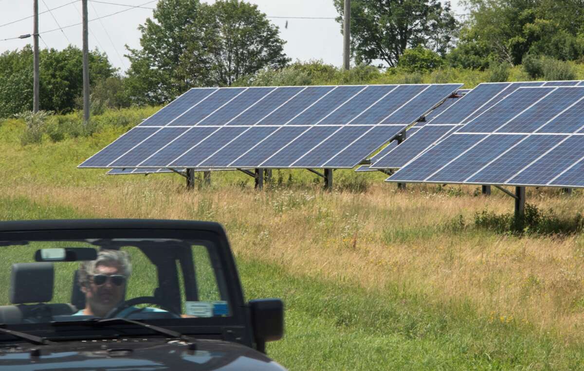 A coalition of towns has gone to court to protest the the way they have been told by the state to assess solar farms.