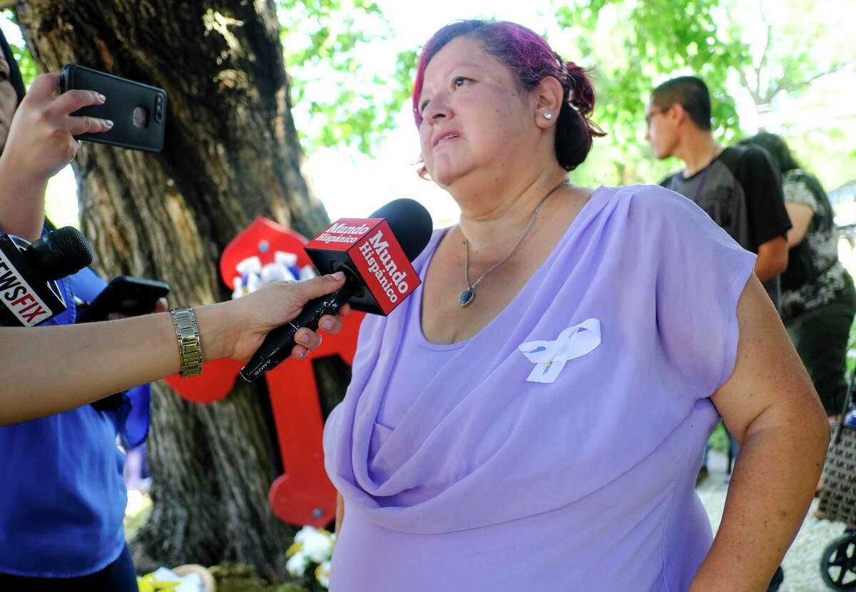 Maria Flores talks to the media after an event marking the second anniversary of when her son, Josue, 11, was stabbed to death walking home from school on Thursday, May 17, 2018 in Houston. (Elizabeth Conley/Houston Chronicle)