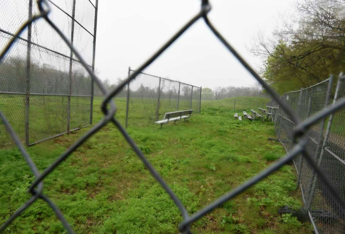 The fields remain closed at Western Middle School in Greenwich, Conn. Monday, May 2, 2022. The school board is looking to clean up the fields at Western Middle, which have been closed due to contamination issues for several years.