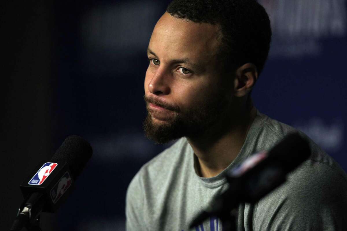 Stephen Curry listens to a question regarding Draymond Green’s Flagrant 2 being upheld at a press conference during an off day practice before the Golden State Warriors played the Memphis Grizzlies in Game 2 of the second round of the NBA Playoffs at Fedex Forum in Memphis, Tenn., on Monday, May 2, 2022.