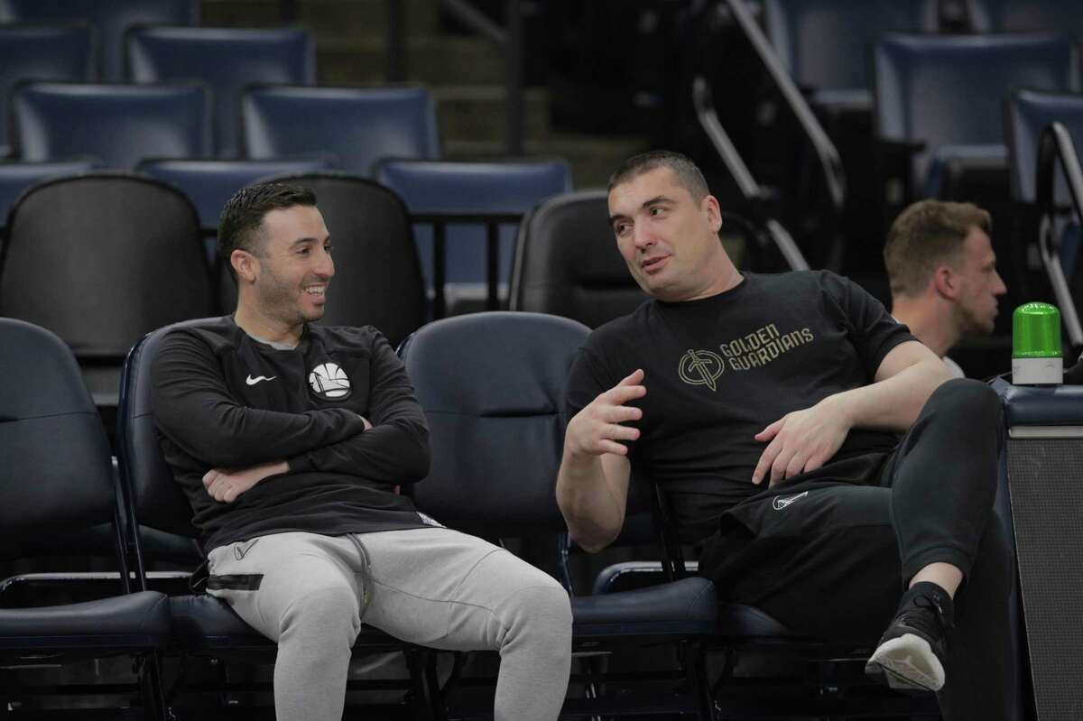 Jacob Rubin, Warriors players development coach, watches players with Dejan Milojevic, right, during an off day practice before the Golden State Warriors played the Memphis Grizzlies in Game 2 of the second round of the NBA Playoffs at Fedex Forum in Memphis, Tenn., on Monday, May 2, 2022.