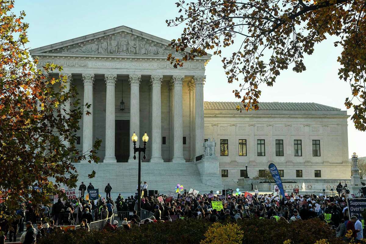 Anti-abortion activists demonstrated outside the U.S. Supreme Court in Washington, Dec. 1, 2021, on the first day of oral arguments for Dobbs v. Jackson, which could be the most consequential abortion rights ruling in decades.