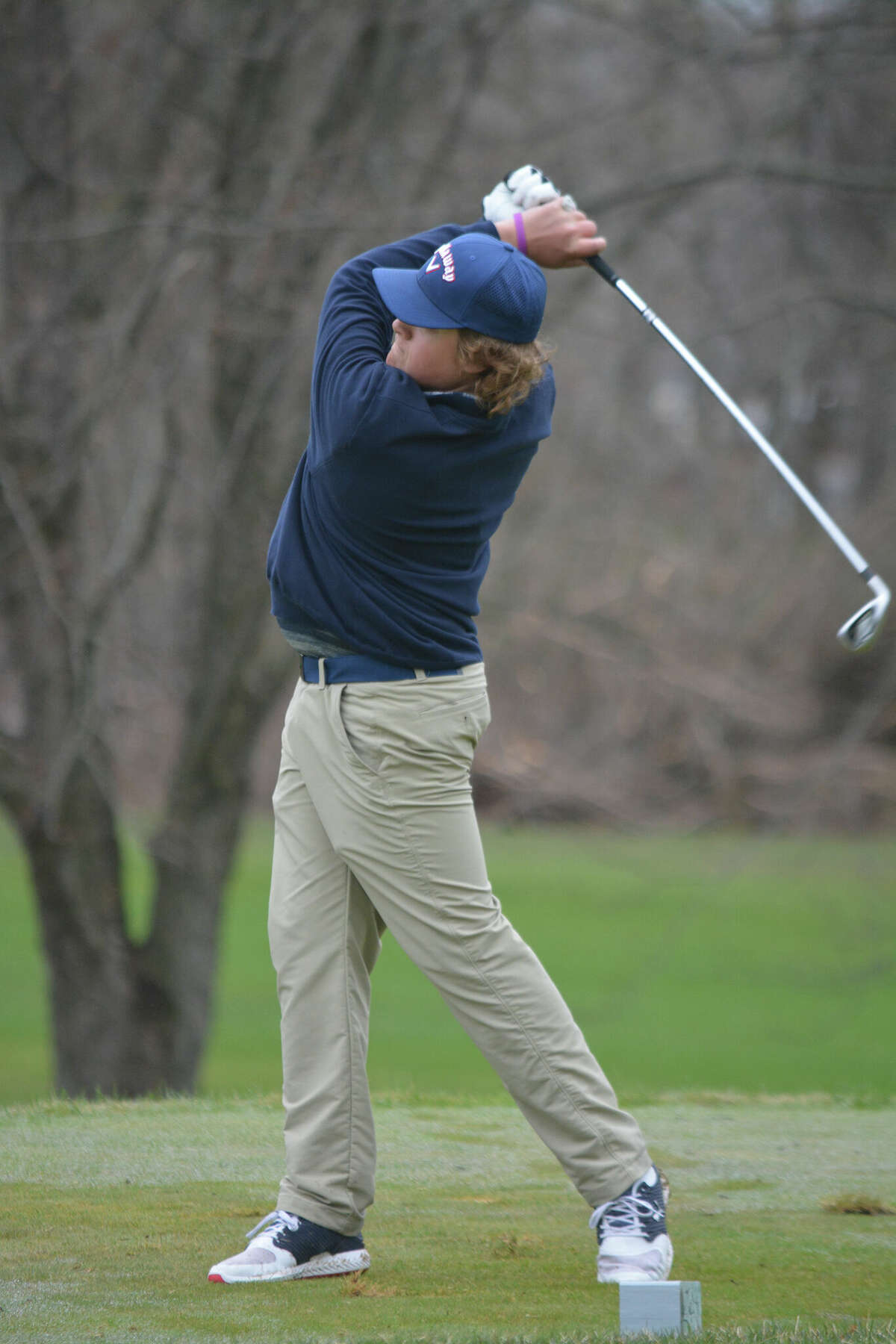 Brayden Olds follows through on his shot for Big Rapids on Monday at Katke Golf Course. 