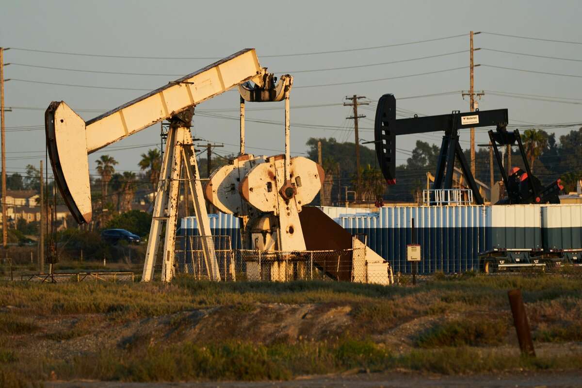 Pumpjacks extract crude oil from active oil wells at the Synergy Oil Field on the Los Cerritos Wetlands in Seal Beach, California, U.S., on Saturday, April 23, 2022